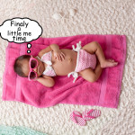 Newborn Baby Girl Wearing A Bikini And Sunglasses